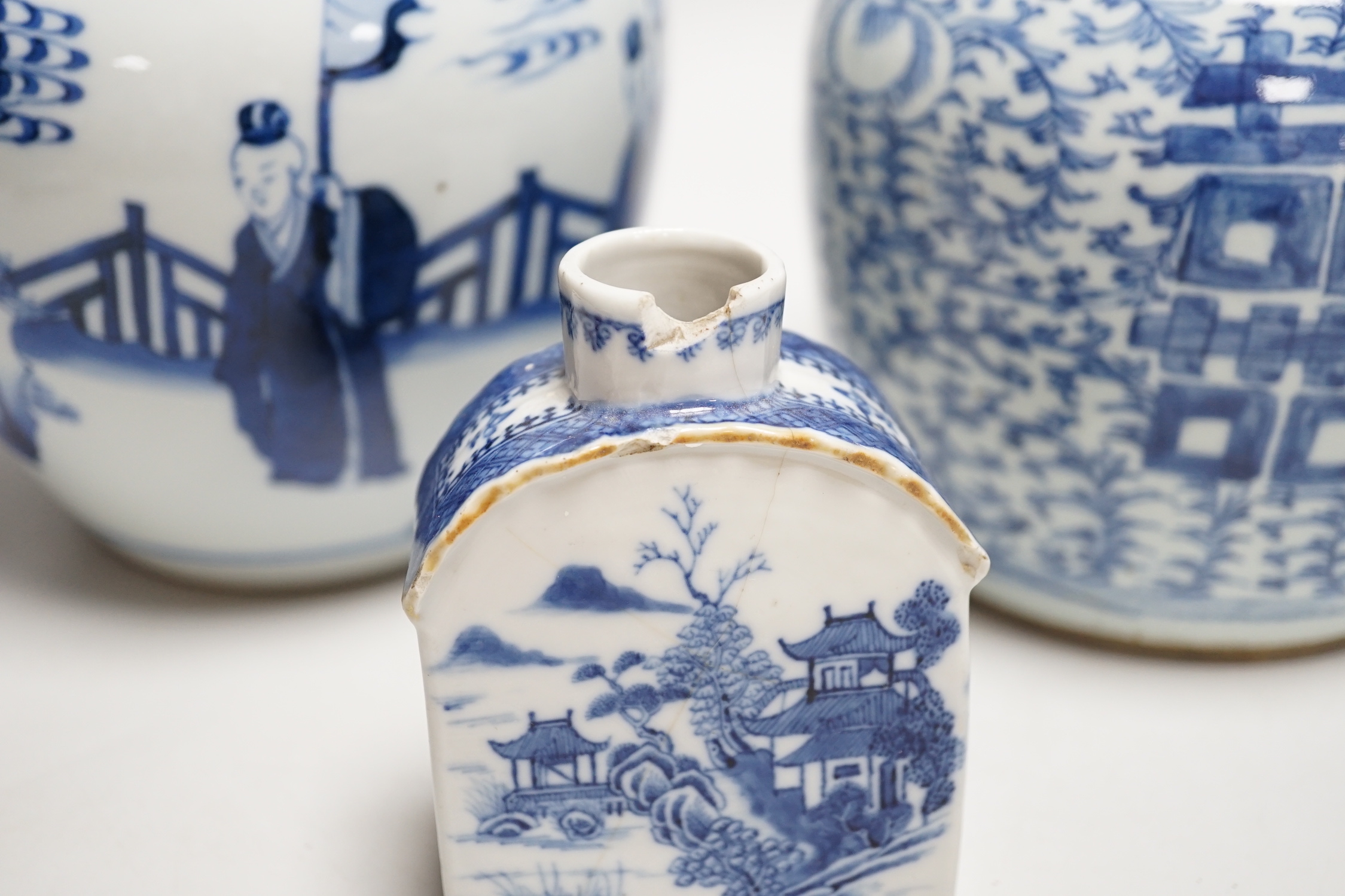 Two Chinese blue and white jars and a similar tea caddy